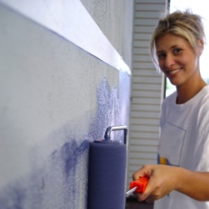 homeowner painting the walls