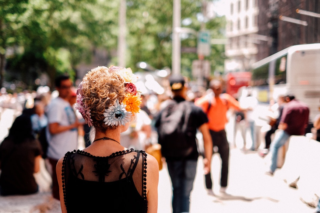 A woman with flowers in her hair. 