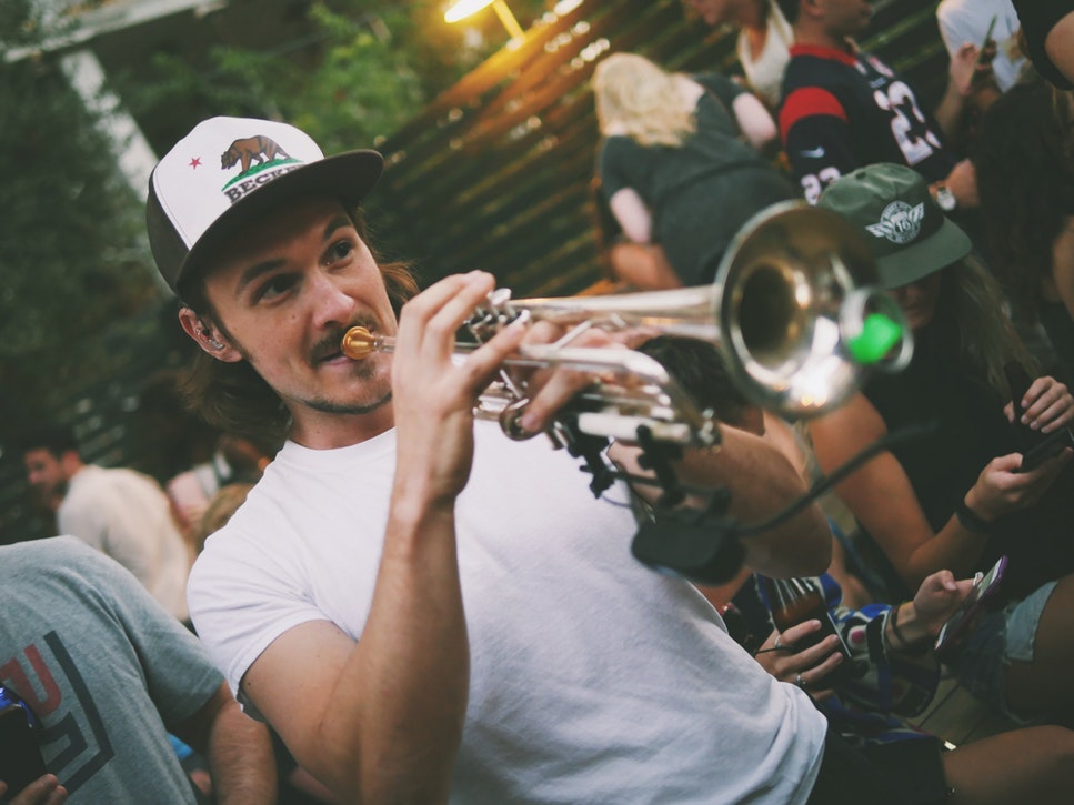 A man playing the trumpet. 