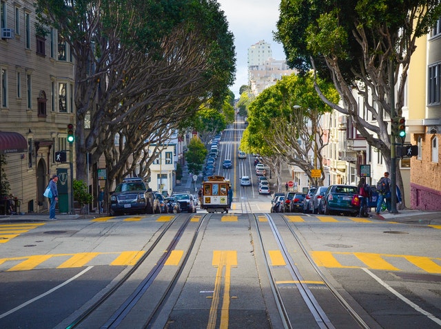 street view of trolley rails going down san francisco streets.